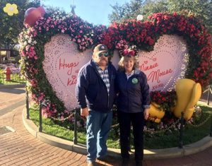 Arthur Scott Pilkenton in front of a giant valentine heart